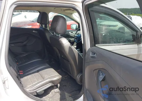 2014 Ford Escape Titanium z USA, uszkodzony, nr VIN 1FMCU9J90EUB13882